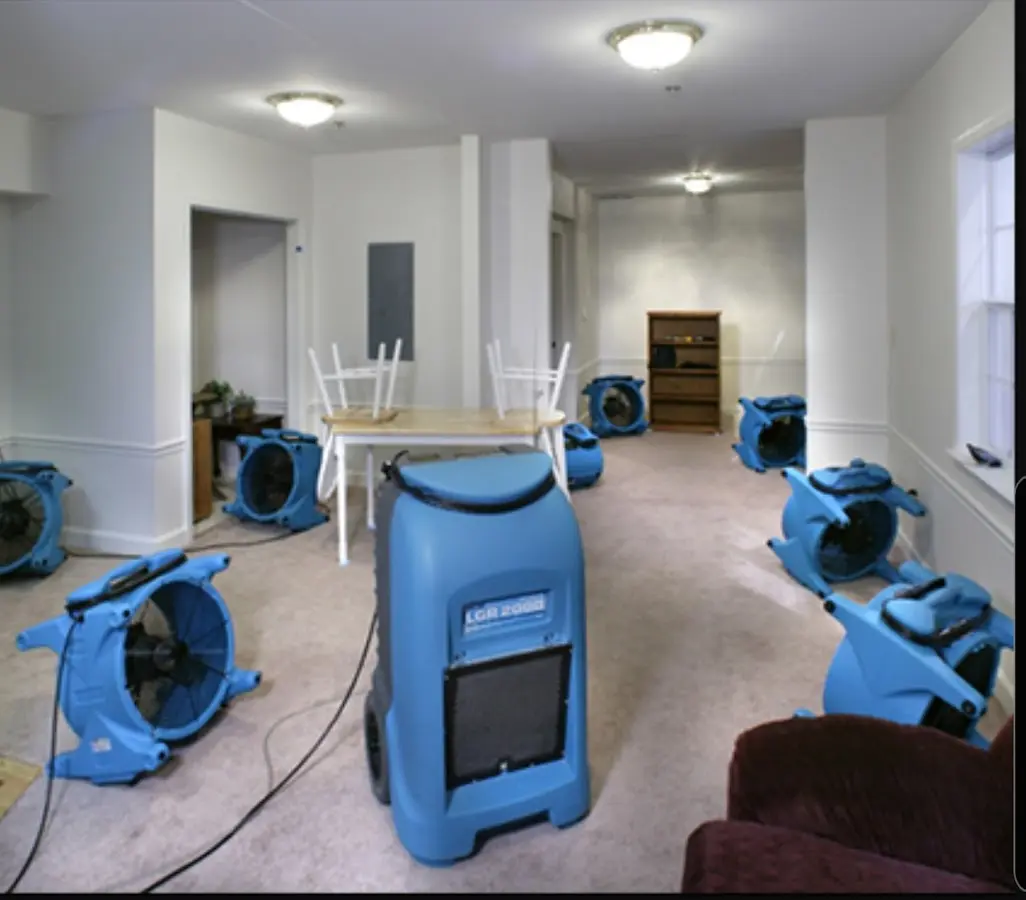 Air movers and dehumidifier setup for Water Damage Restoration in Jeannette